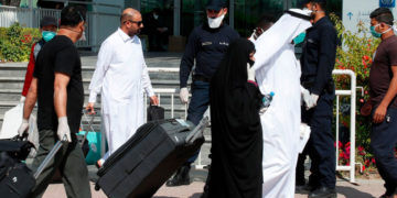 كۆمه‌ڵێك گه‌شتیارى عه‌ره‌ب | فؤتؤ: AFP/Getty Images