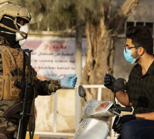 جێبهجێكردنى رێكارهكانى رووبهڕووبوونهوهى كۆرۆنا له عێراق: فۆتۆ: Hussein Faleh / AFP