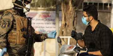 جێبهجێكردنى رێكارهكانى رووبهڕووبوونهوهى كۆرۆنا له عێراق: فۆتۆ: Hussein Faleh / AFP