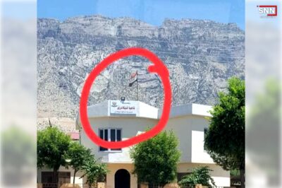 هه‌ڵكردنى ئاڵاى عێراق له‌سه‌ر به‌ڕێوه‌به‌رایه‌تى ناحیه‌ى شیلادزێ | فۆتۆ: تۆڕه‌ كۆمه‌ڵایه‌تییه‌كان